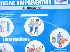 This picture was taken in a Catholic run health centre in Kenya. It is a HIV/AIDs prevention poster in which a sticker has been put over the phrase â€˜Use a Condomâ€™.